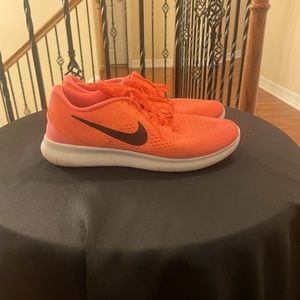 Nike orange size 9 running shoes